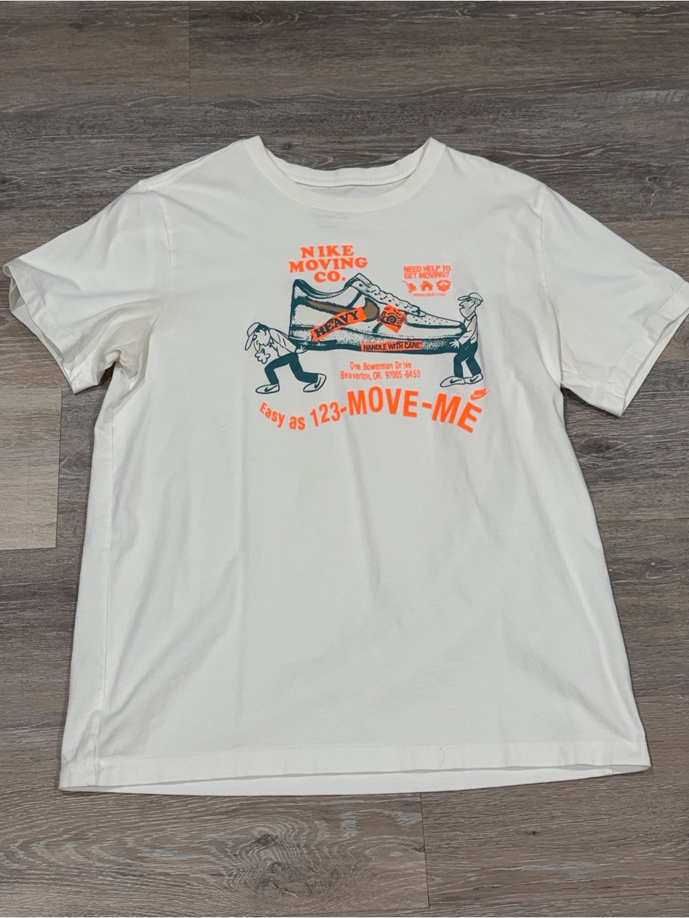 Nike Men’s White Short-Sleeve Graphic Tee with Orange & Teal Print